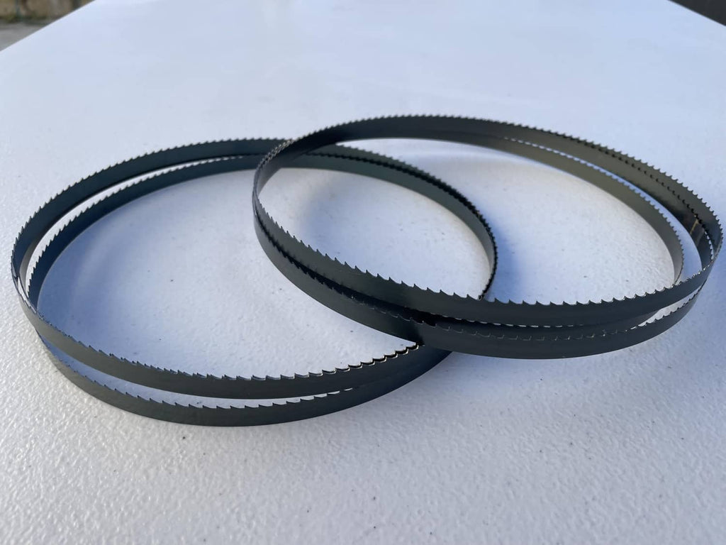 Wood bandsaw blade 2-pack, overlapping dark blue coiled loops on surface
