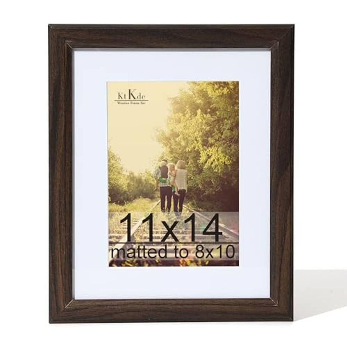 Dark walnut woodgrain picture frame with clear glass, showing an 11x14 photo with mat