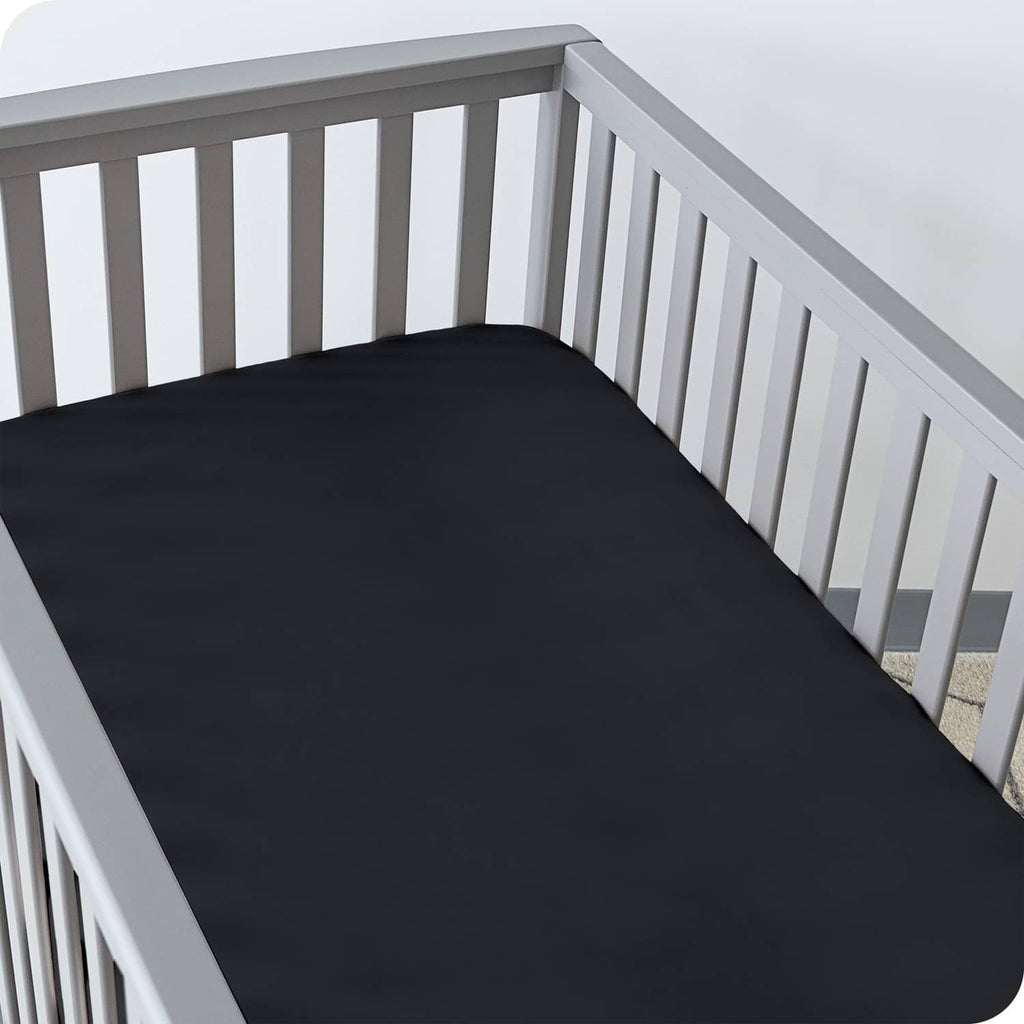 Crib fitted sheet, dark charcoal microfiber with smooth fitted surface on mattress