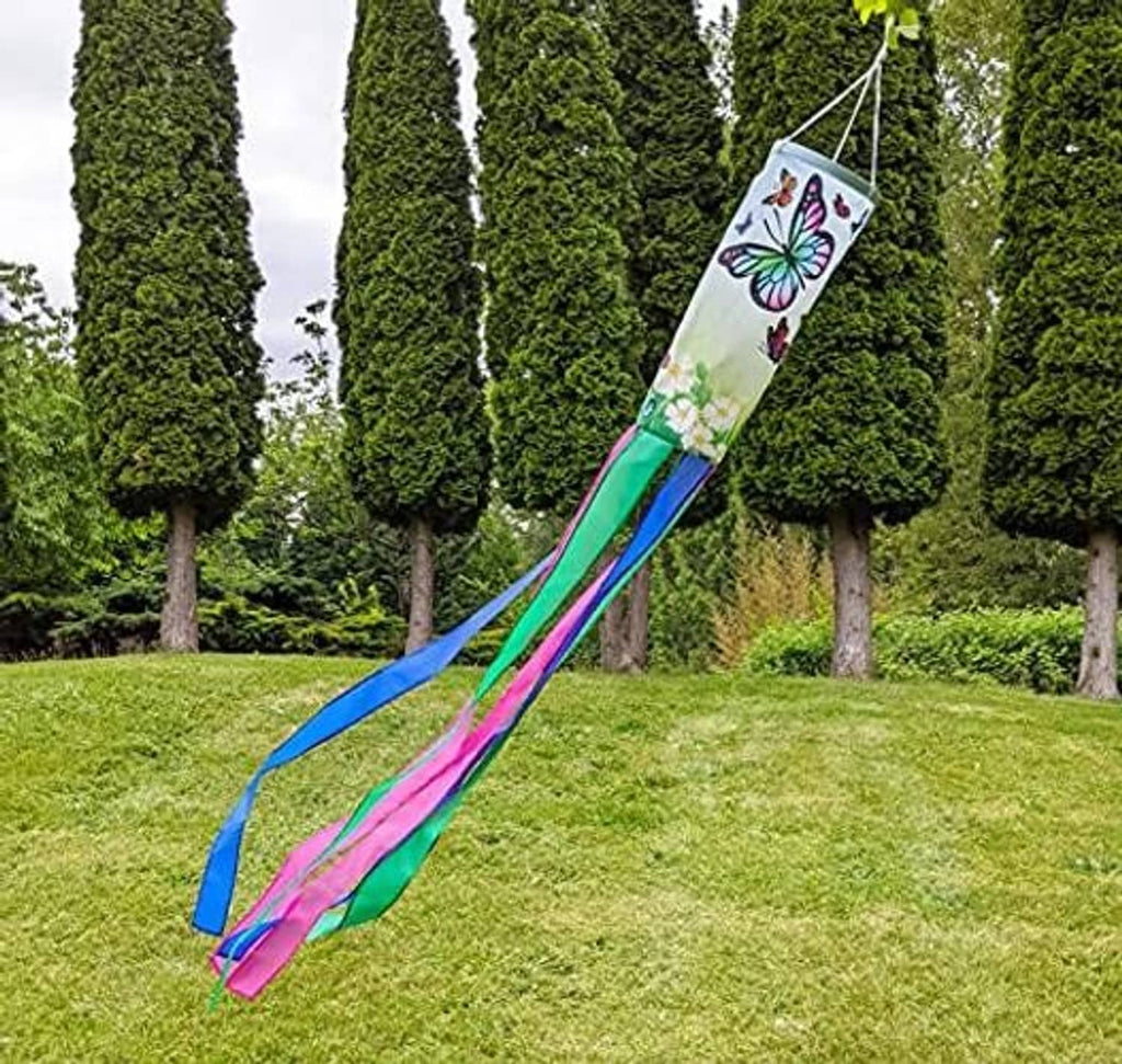 Butterfly windsock on lawn with long multicolor ribbon streamers