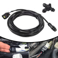 Engine interface cable with T-connector, coiled black cable and multi-pin plug end.