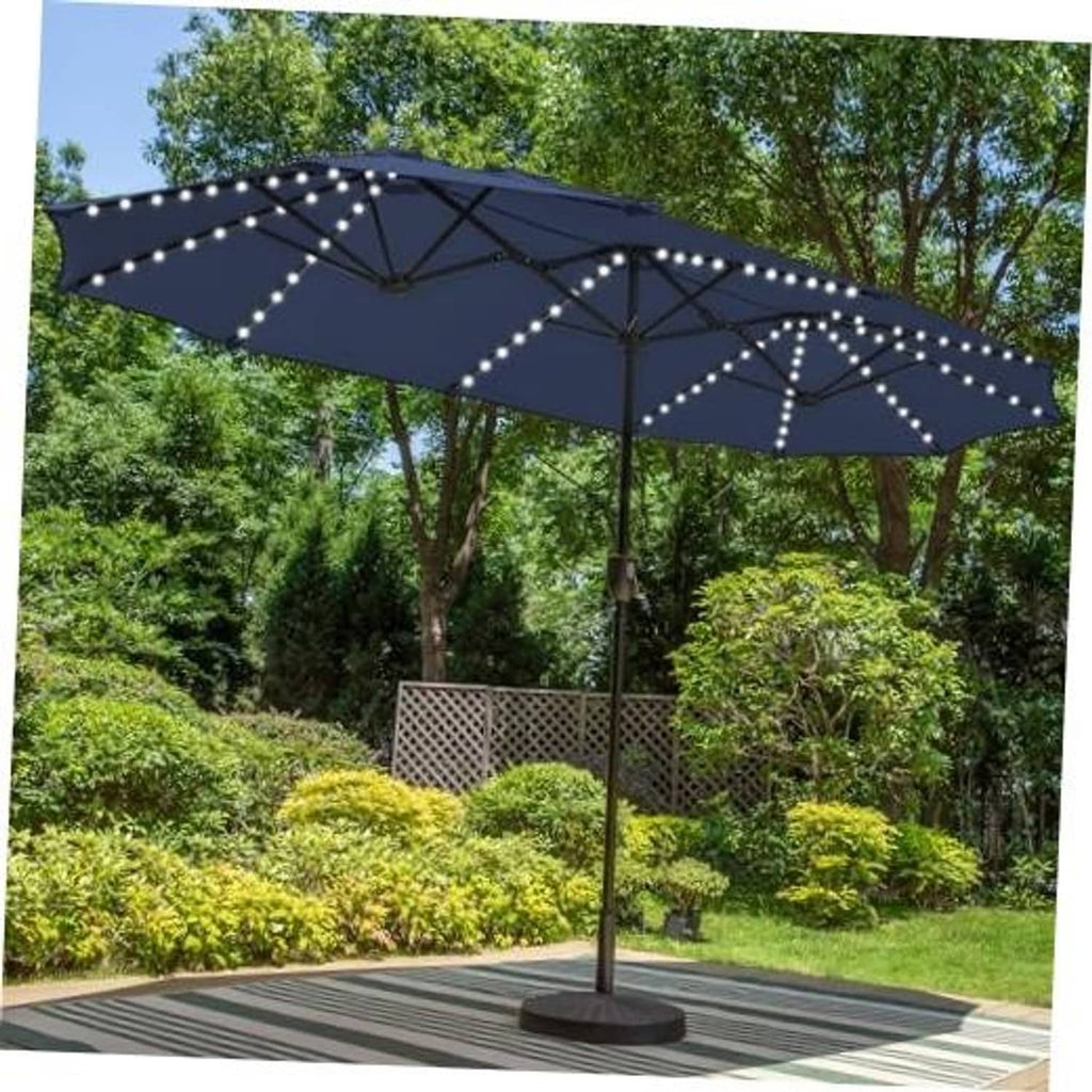 Navy 13 ft patio umbrella with solar LED string lights around the canopy edges