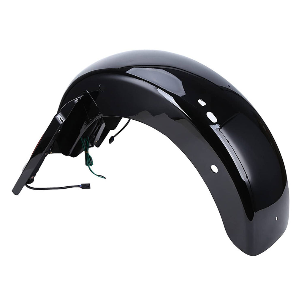 Black rear fender, isolated, with mounting holes and attached wire harness.