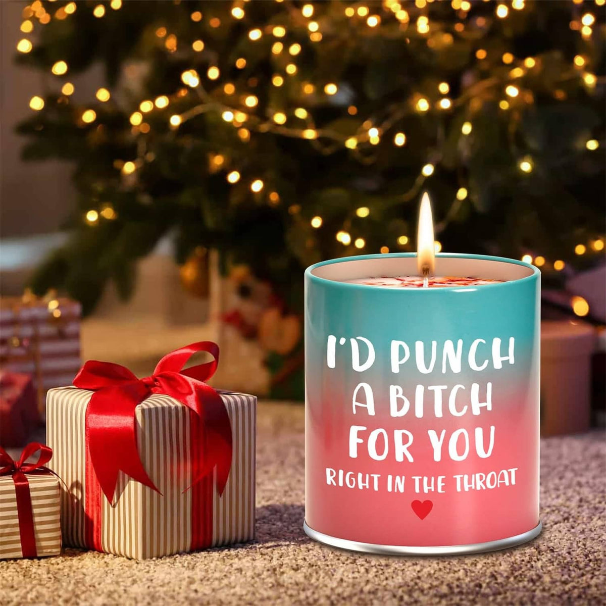 Scented candle in teal and pink metal cup, flame lit, text design