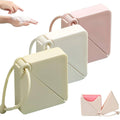 Pastel travel soap sheet dispenser boxes with lanyards, shown for hand washing