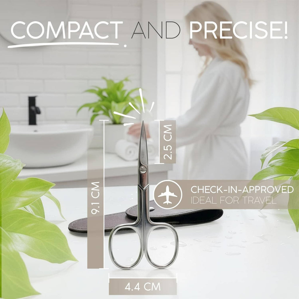 Compact silver nail scissors with curved blades and finger rings for easy trimming