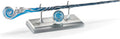 Blue-and-silver spiral wand with round blue emblem on silver display stand with four posts