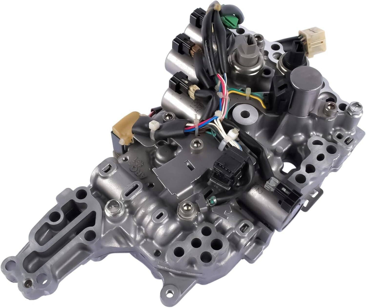 CVT transmission valve body with multi-color wiring and black sensor connectors on silver