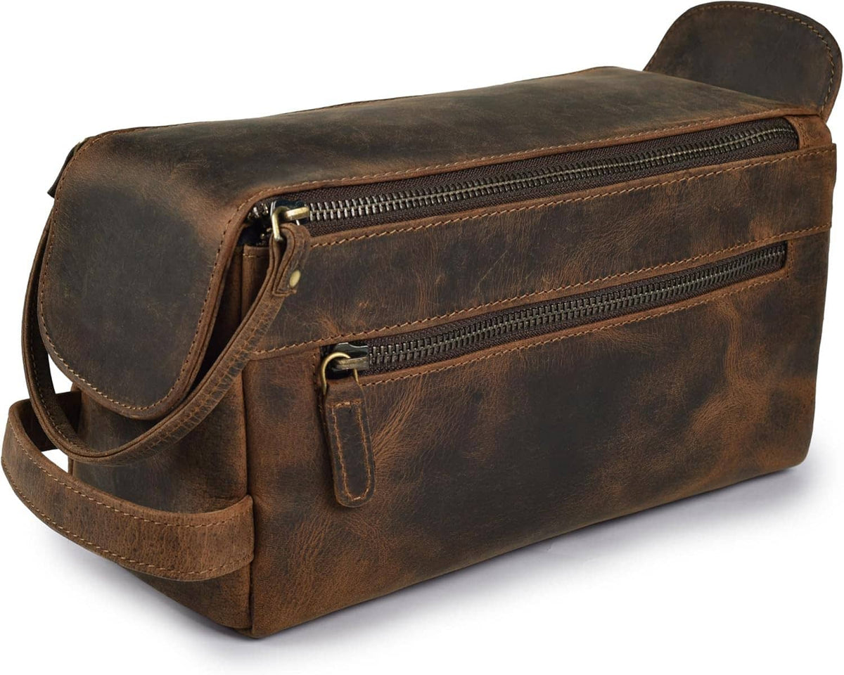Brown leather travel toiletry bag with top zip and side carry strap