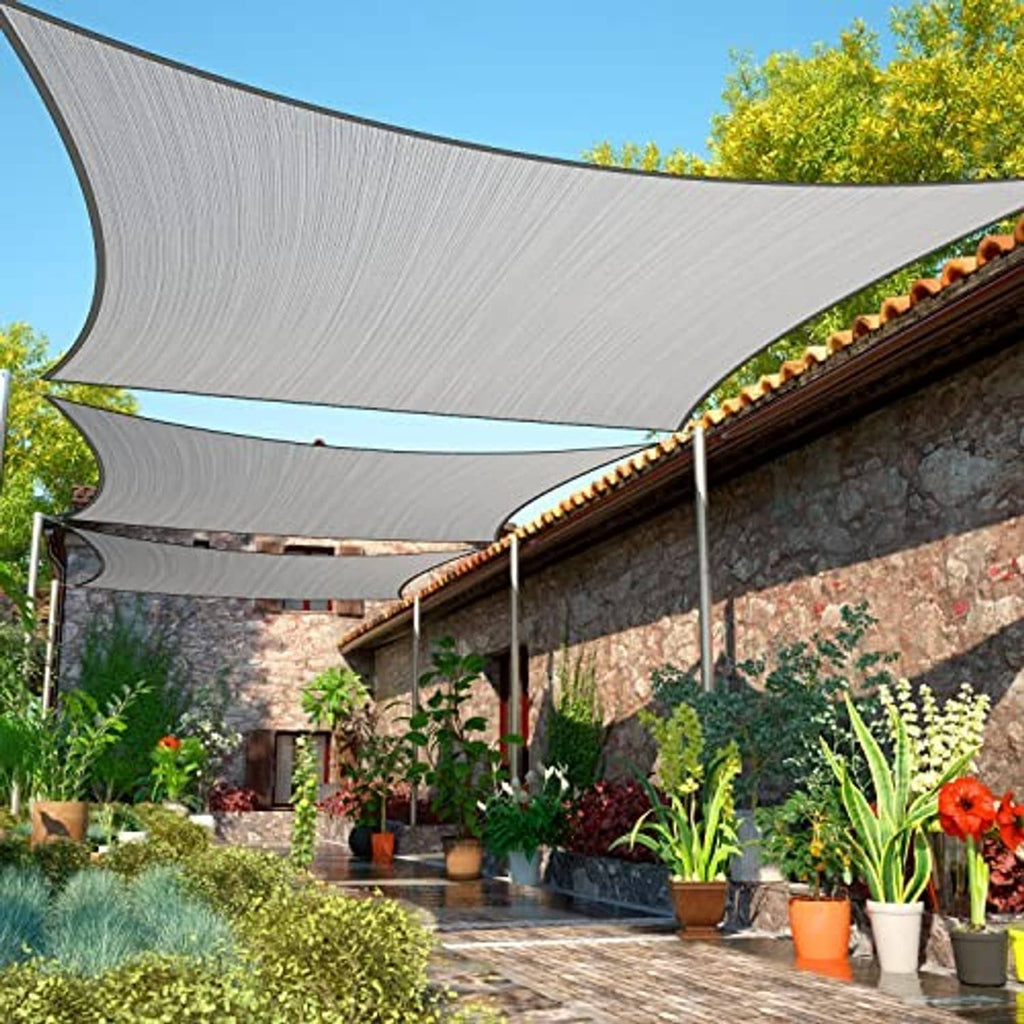Grey rectangle sun shade sail canopy overhead with grommet corners on patio