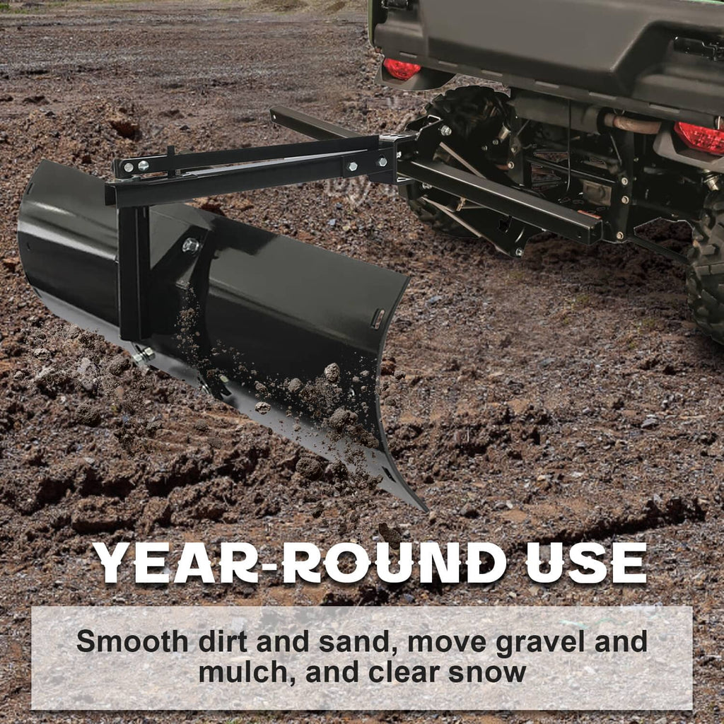 Black tow-behind rear scrape blade attached to a vehicle hitch