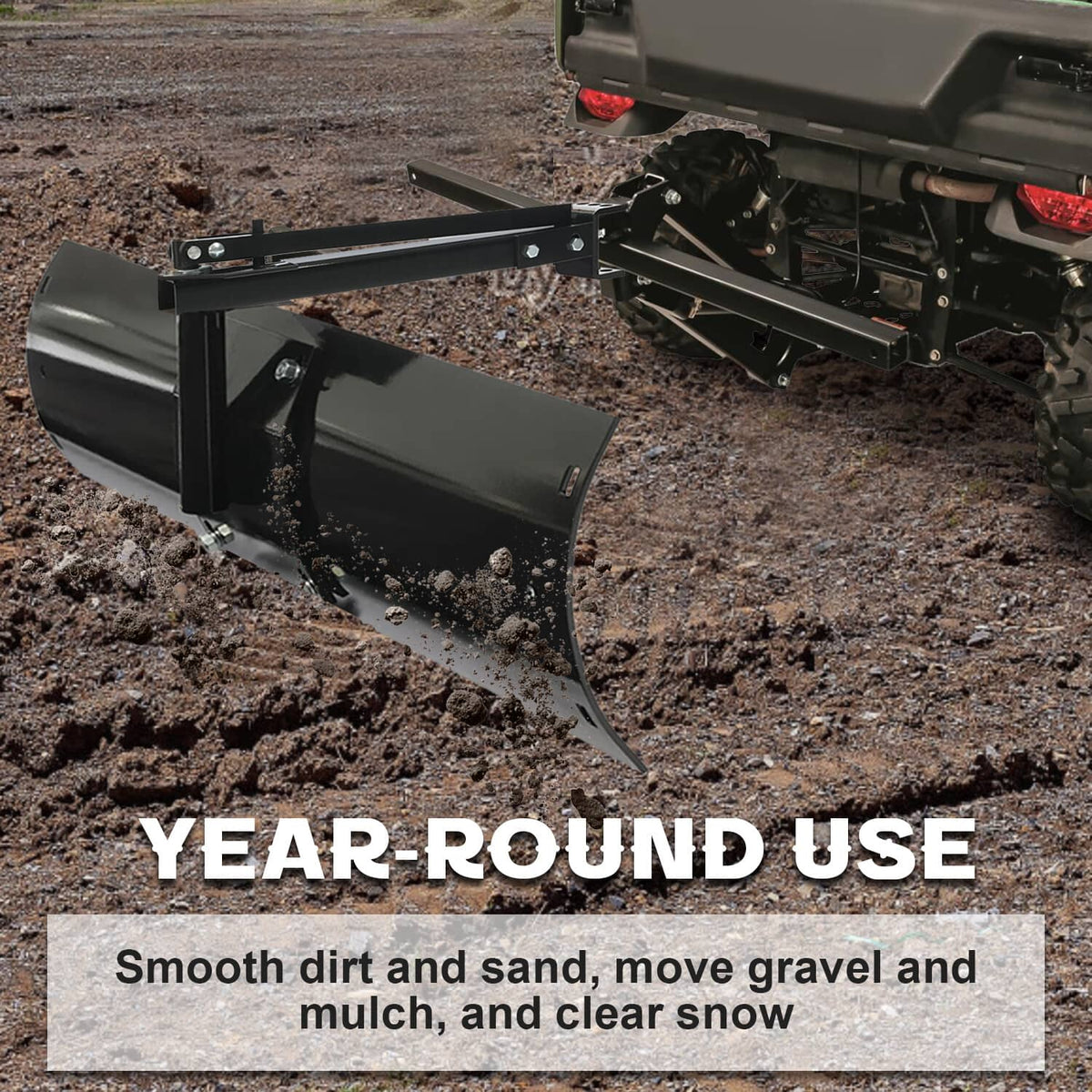 Black tow-behind rear scrape blade attached to a vehicle hitch
