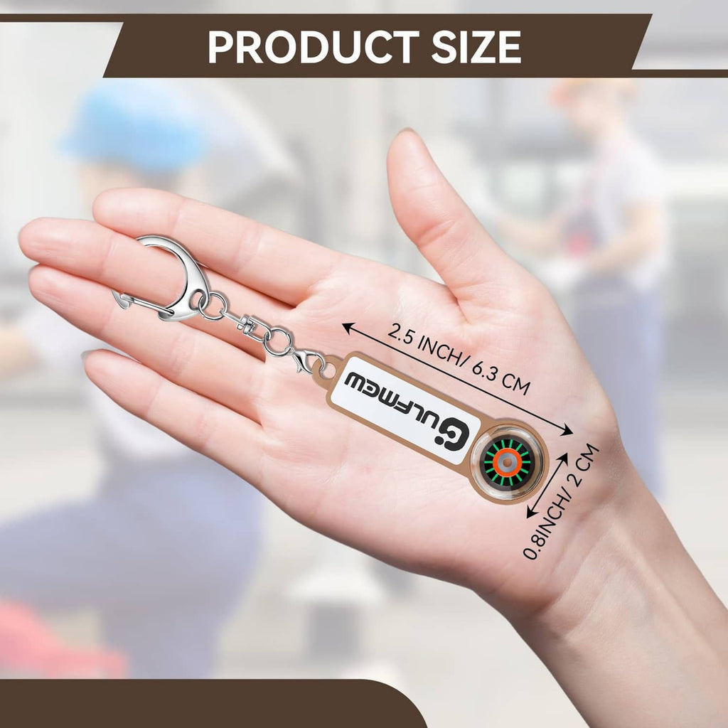 Brown solenoid tester keychain on open palm with colorful magnet disc and size marks