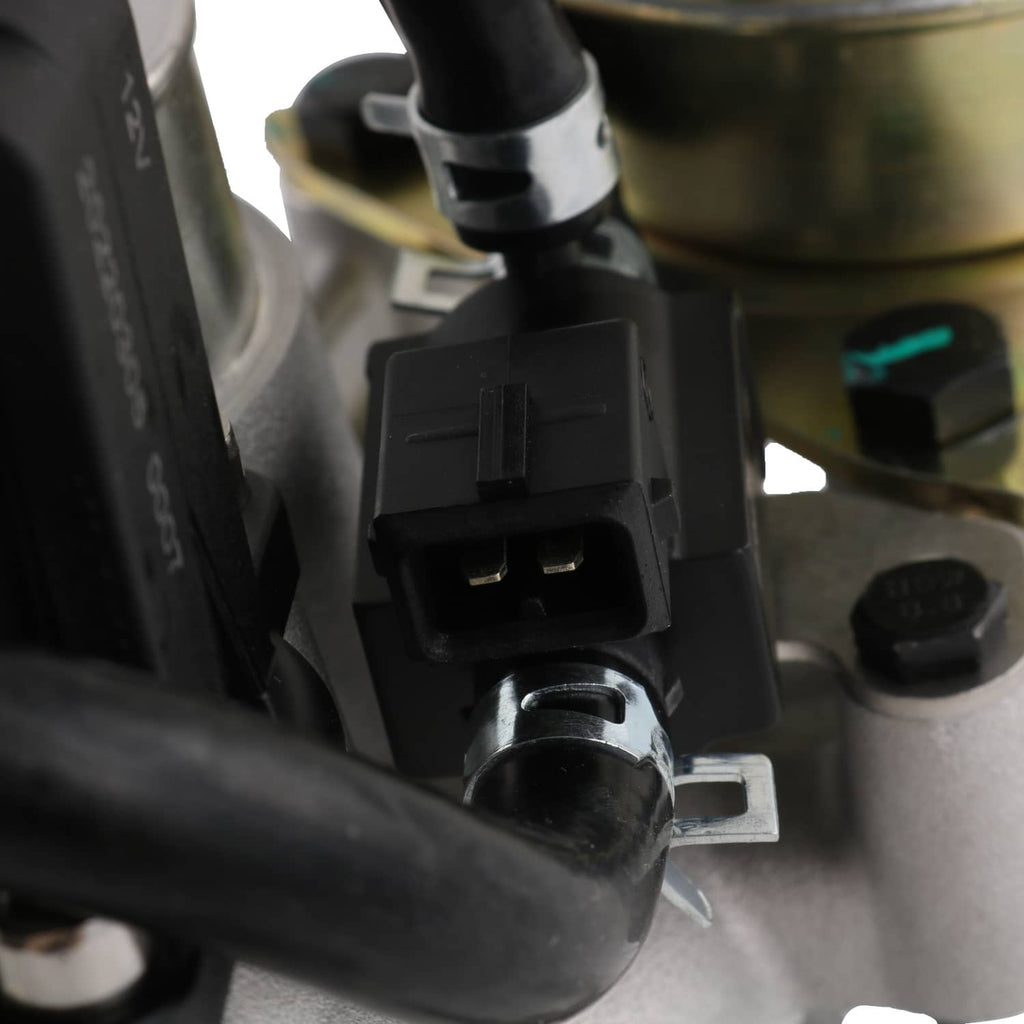 Turbocharger sensor connector on black housing with wiring harness and metal port