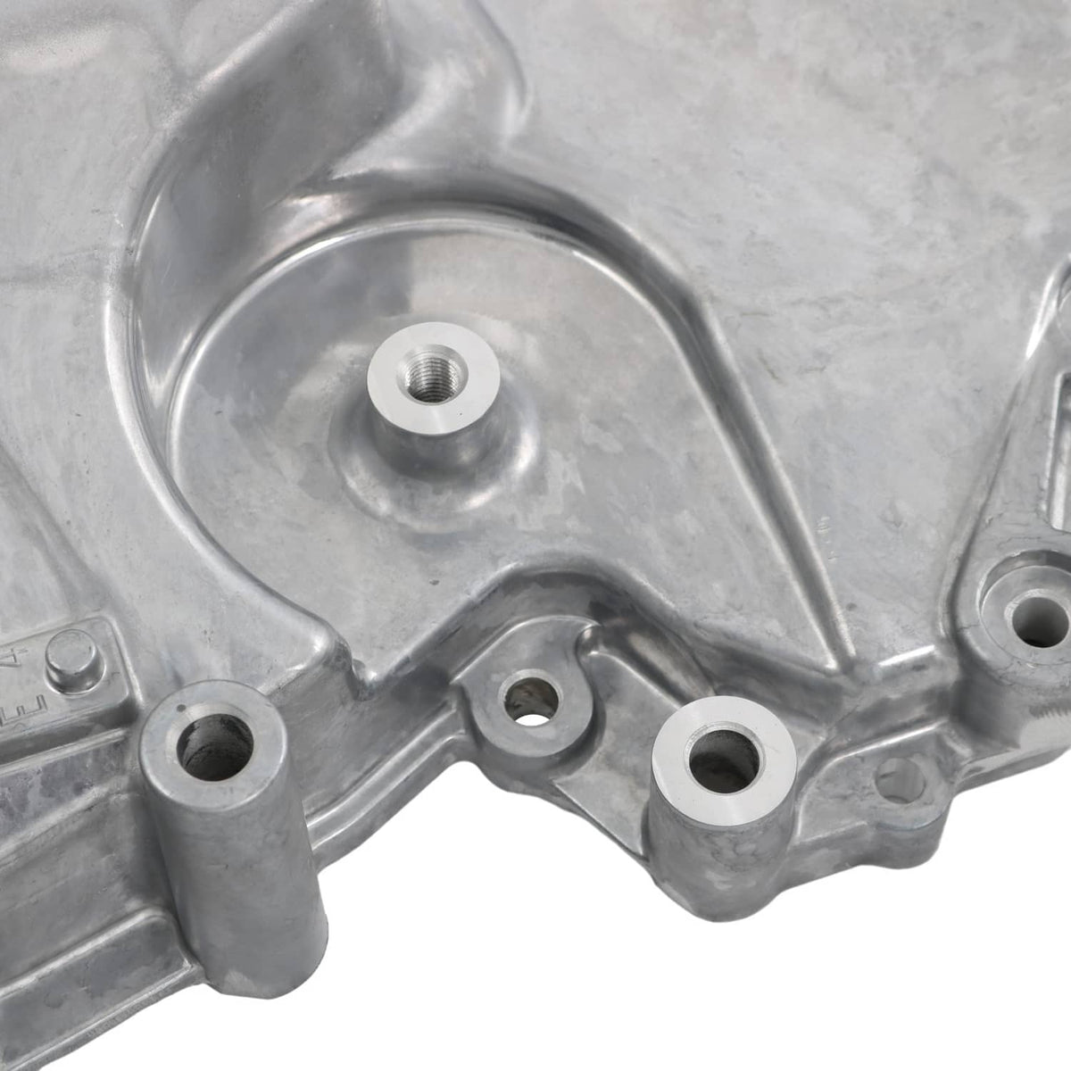 Timing cover oil pump housing close-up of circular gasket surface and mounting holes