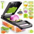 Gray and green vegetable chopper with slicer base and green blade panel, plus attachments
