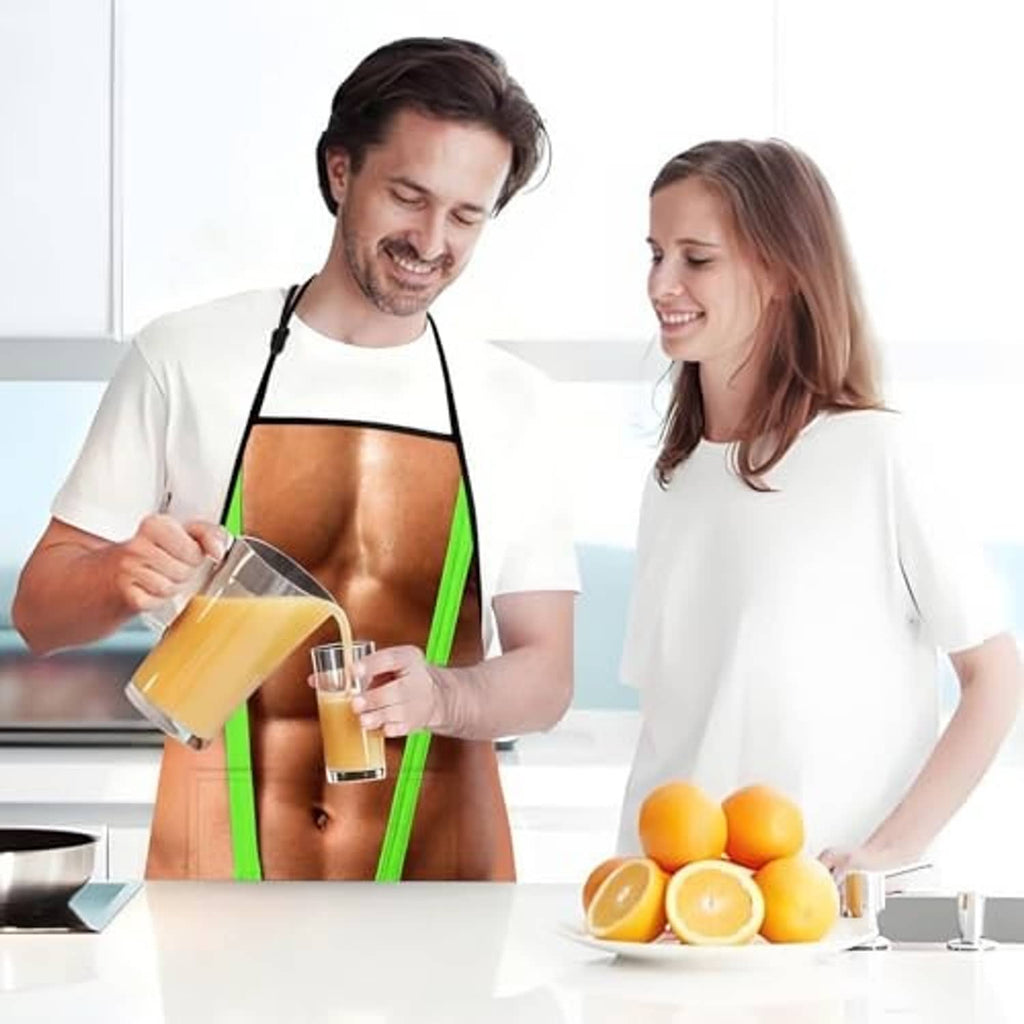 Novelty cooking apron with green trim worn by two people in a kitchen, holding drinks