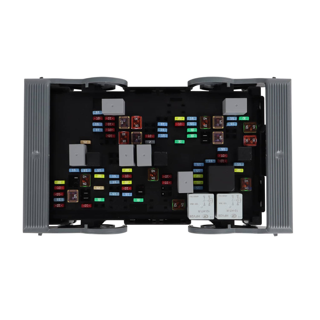 Vehicle fuse relay junction block, open compartment with multiple fuses and relays