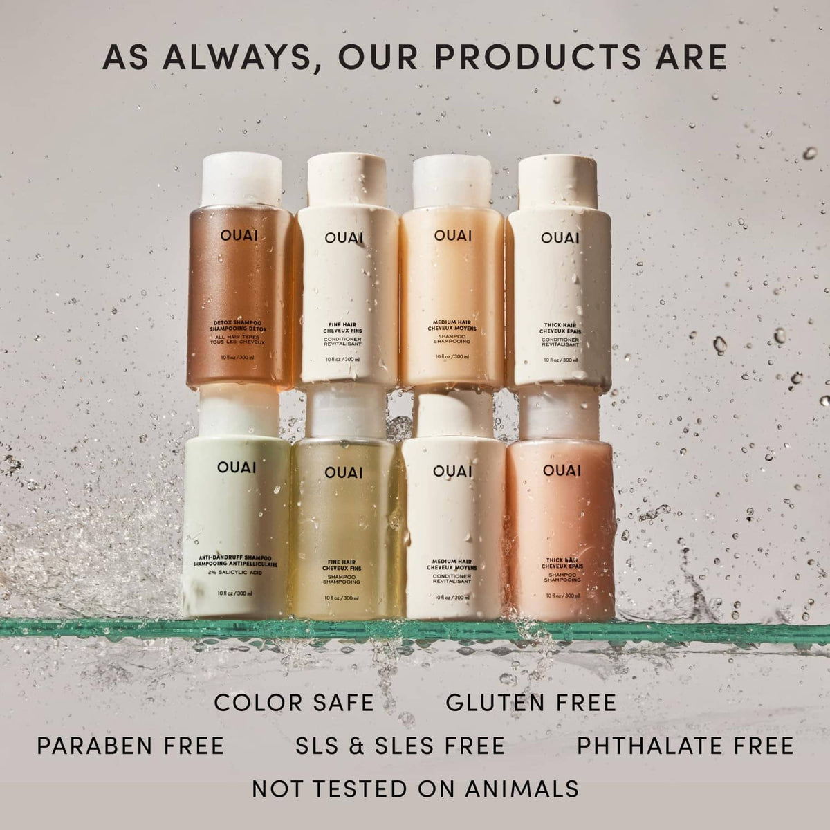 Fine hair care variety set with multiple OUAI bottles, assorted amber and light shades.