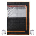 Portable 2-person steam sauna tent in black with orange trim, with two steamers