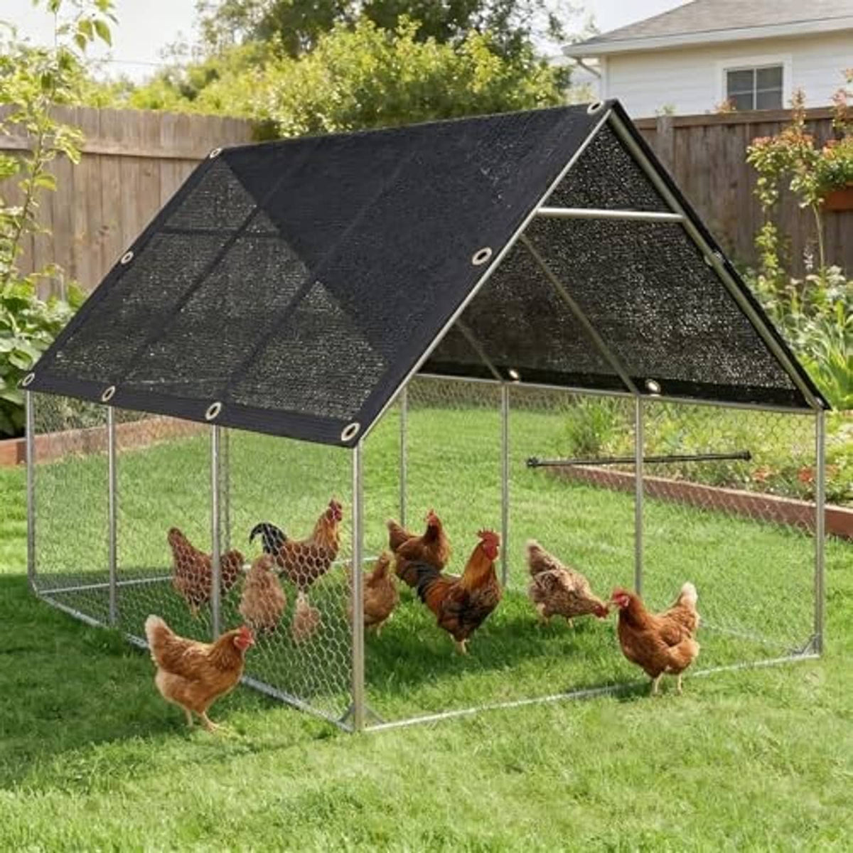 Black mesh shade cloth over chicken coop with brass grommets