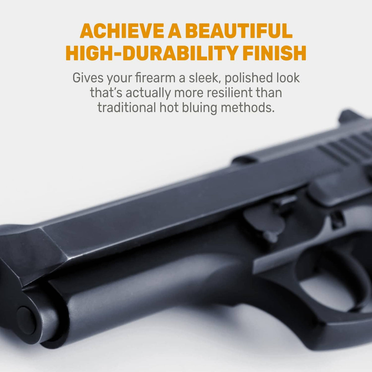 Firearm with dark blue-black surface finish on slide and barrel