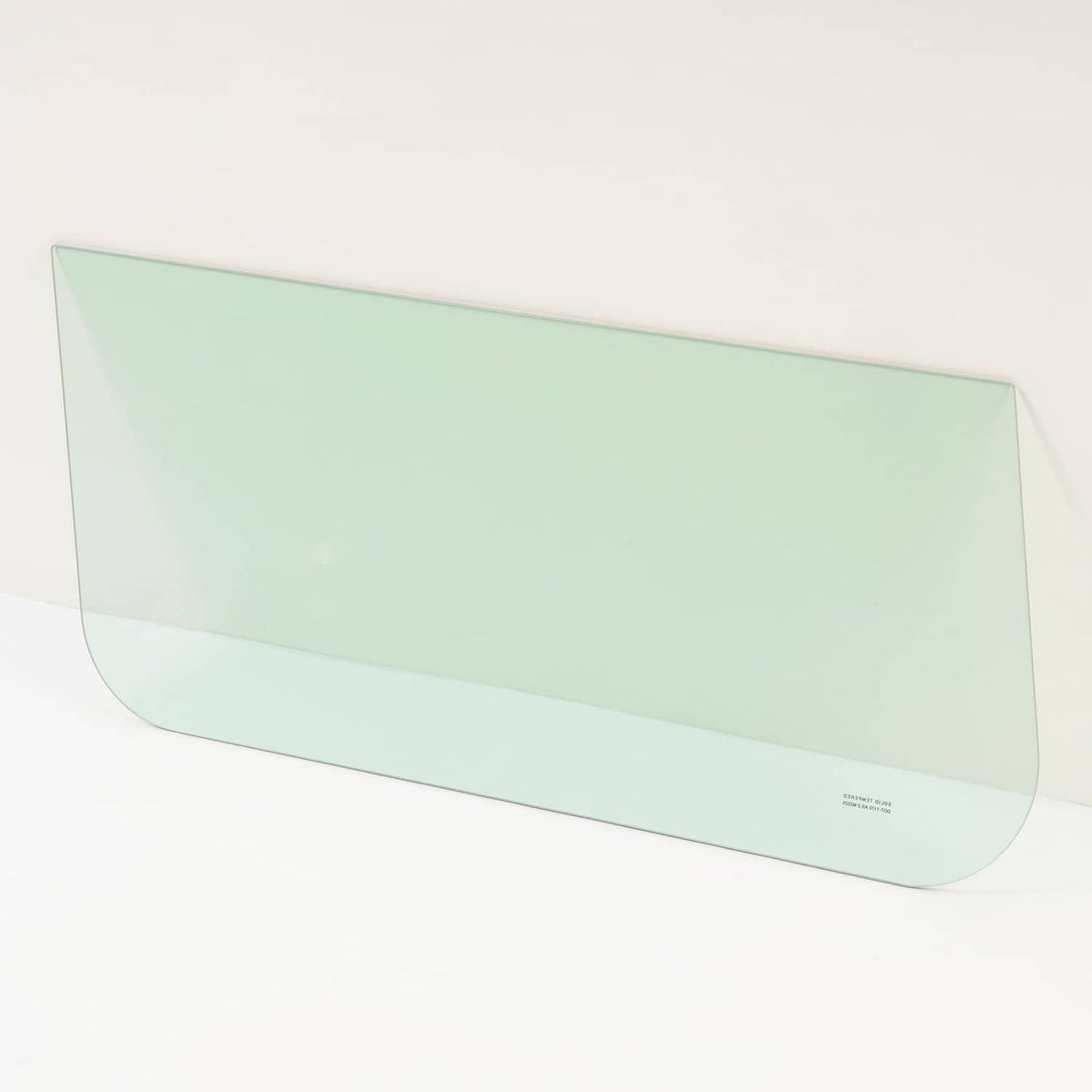 Mint green tinted glass side window panel with rounded corners