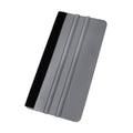 Felt window squeegee scraper with gray ridged handle and black felt edge