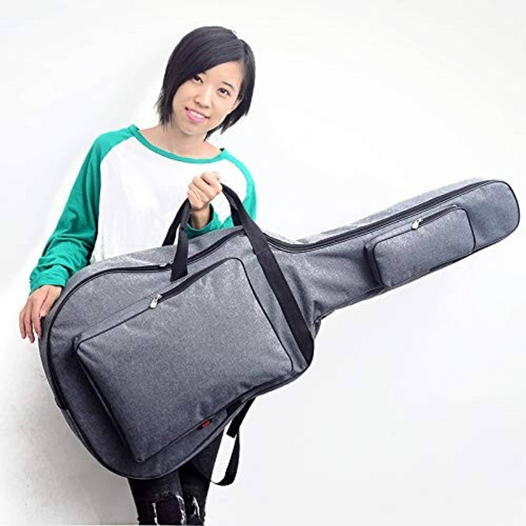 Dark gray guitar gig bag with front zip pocket, top handle, and long shoulder strap.