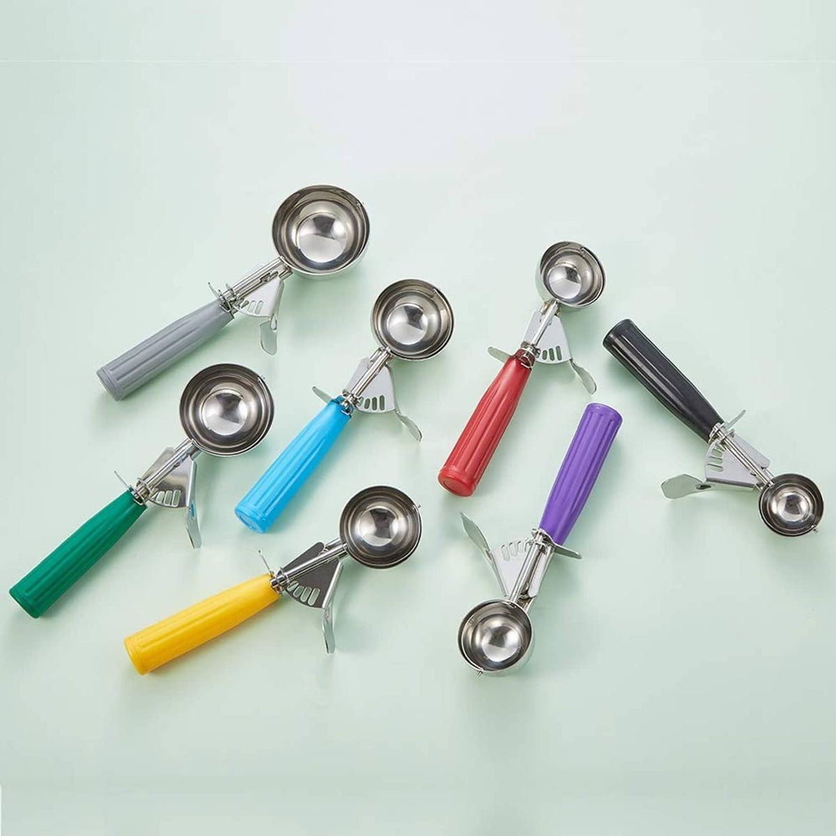 Assorted color cookie disher scoops with stainless steel bowls