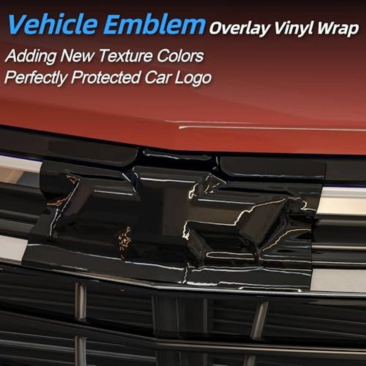 Close-up of glossy black emblem vinyl wrap over a grille bowtie logo area.