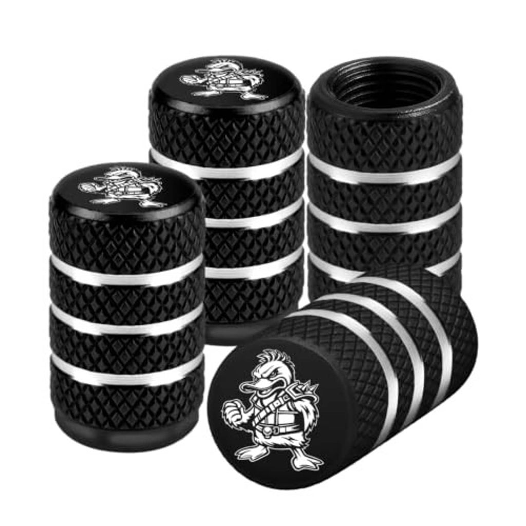 Four black tire valve stem caps with duck emblem, textured grip, and silver ring bands