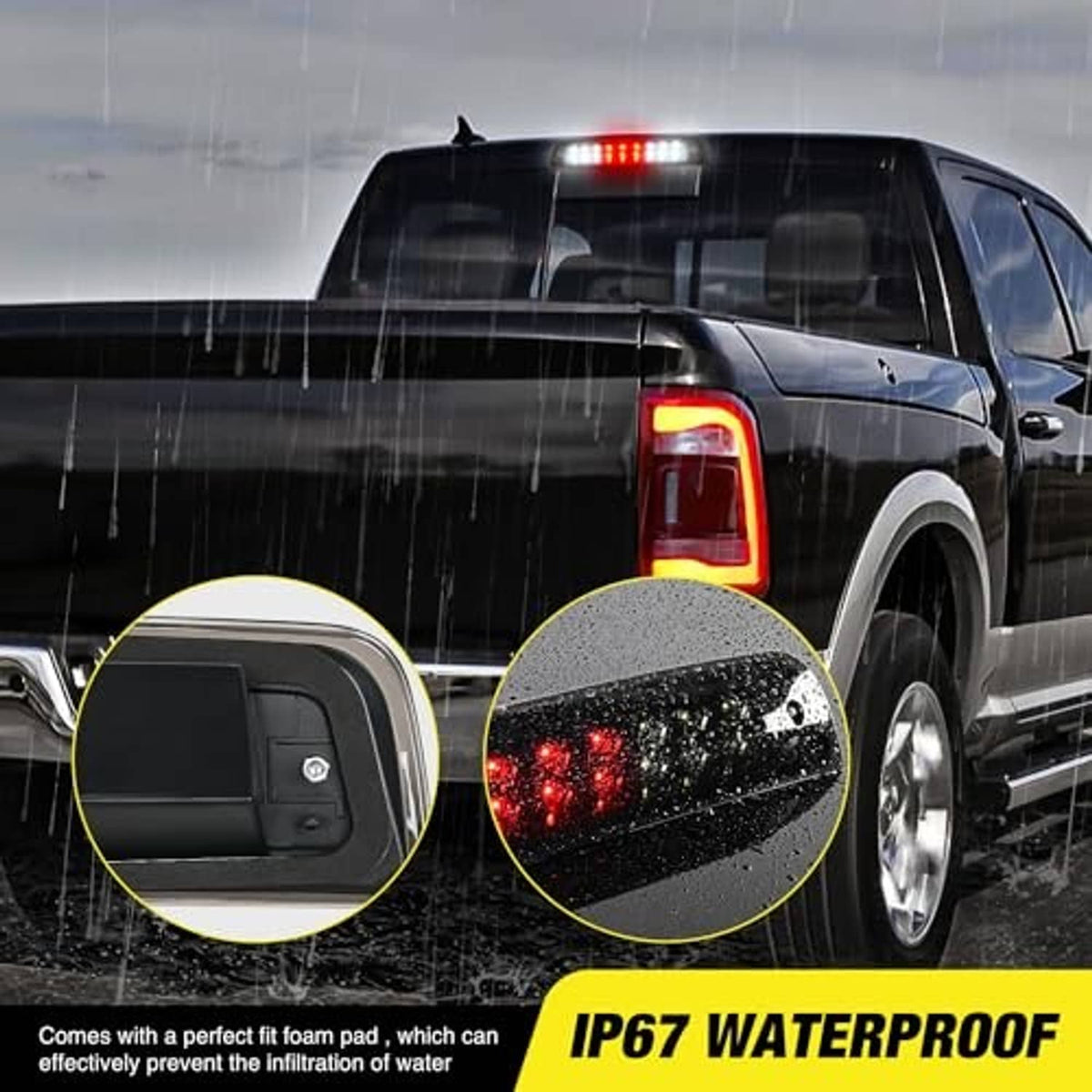 Third brake light assembly on truck cab roof, red LEDs lit in wet conditions