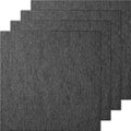 Dark gray carpet tile squares with attached padding, stacked for a layered view
