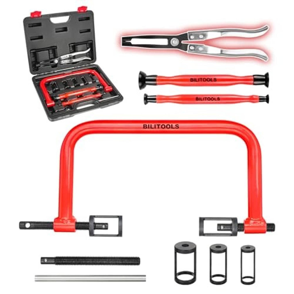Valve spring compressor tool set with red frame, two orange valve tools, and metal sleeves