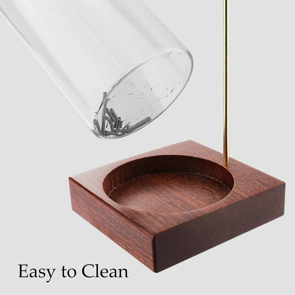 Dark wood incense holder base with open center cup for an incense stick