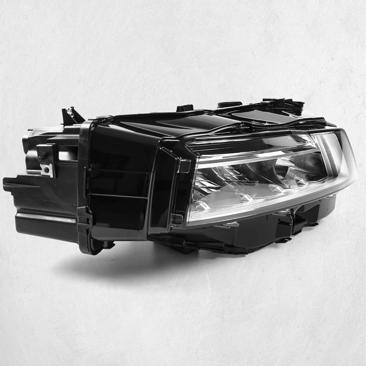 Right LED headlight assembly front view with chrome reflector and clear lens