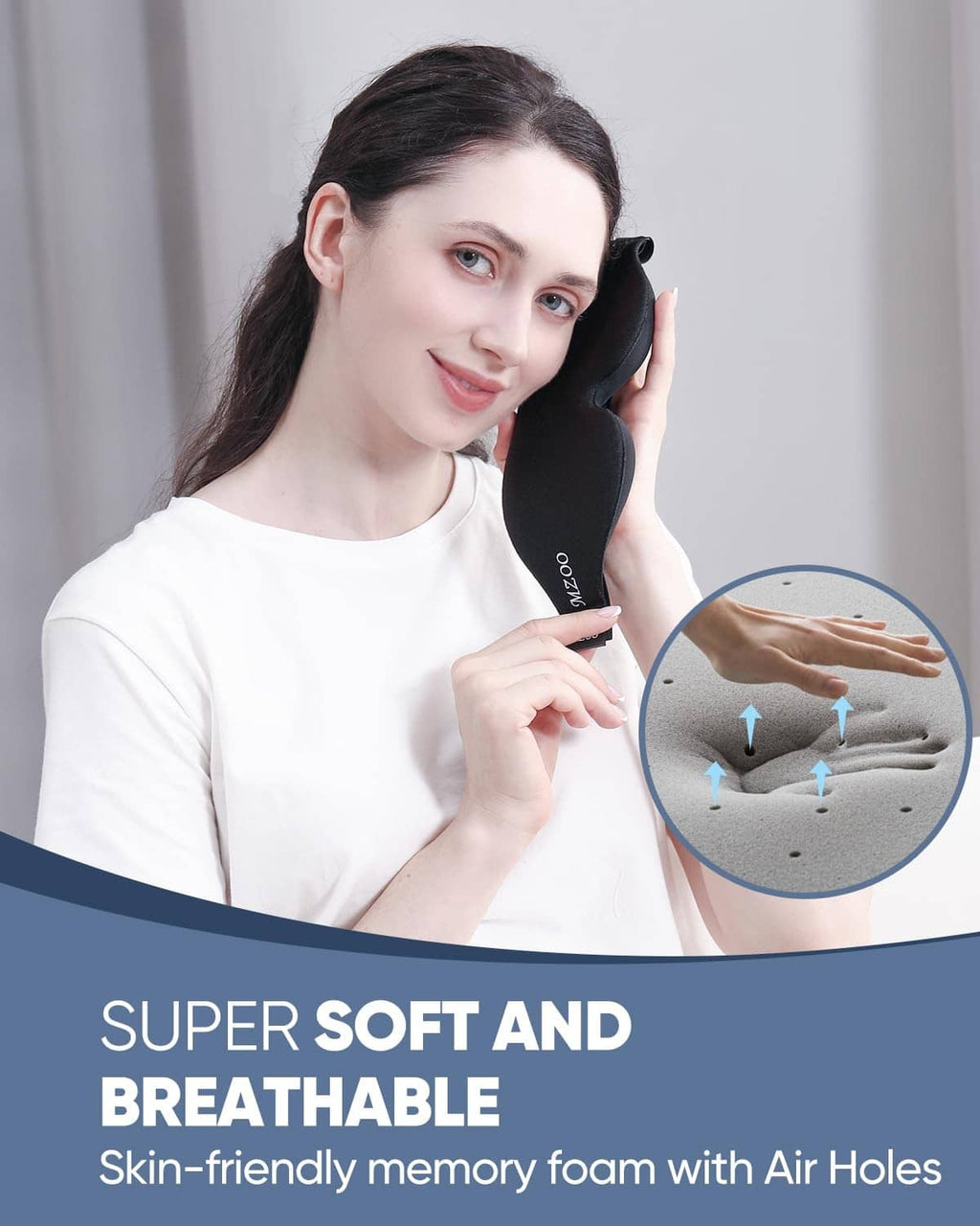 Black sleep eye mask held near face, contoured soft eye cups