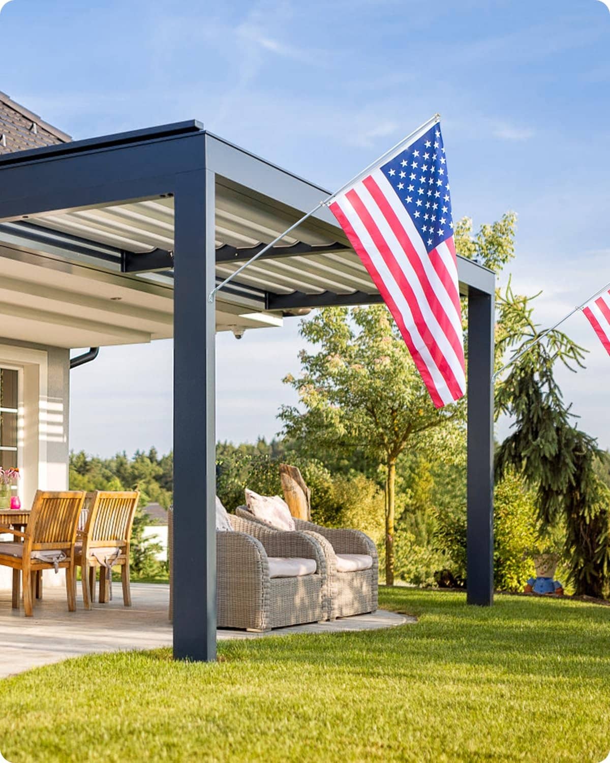Outdoor American flag mounted on a pole with ring hardware securing it