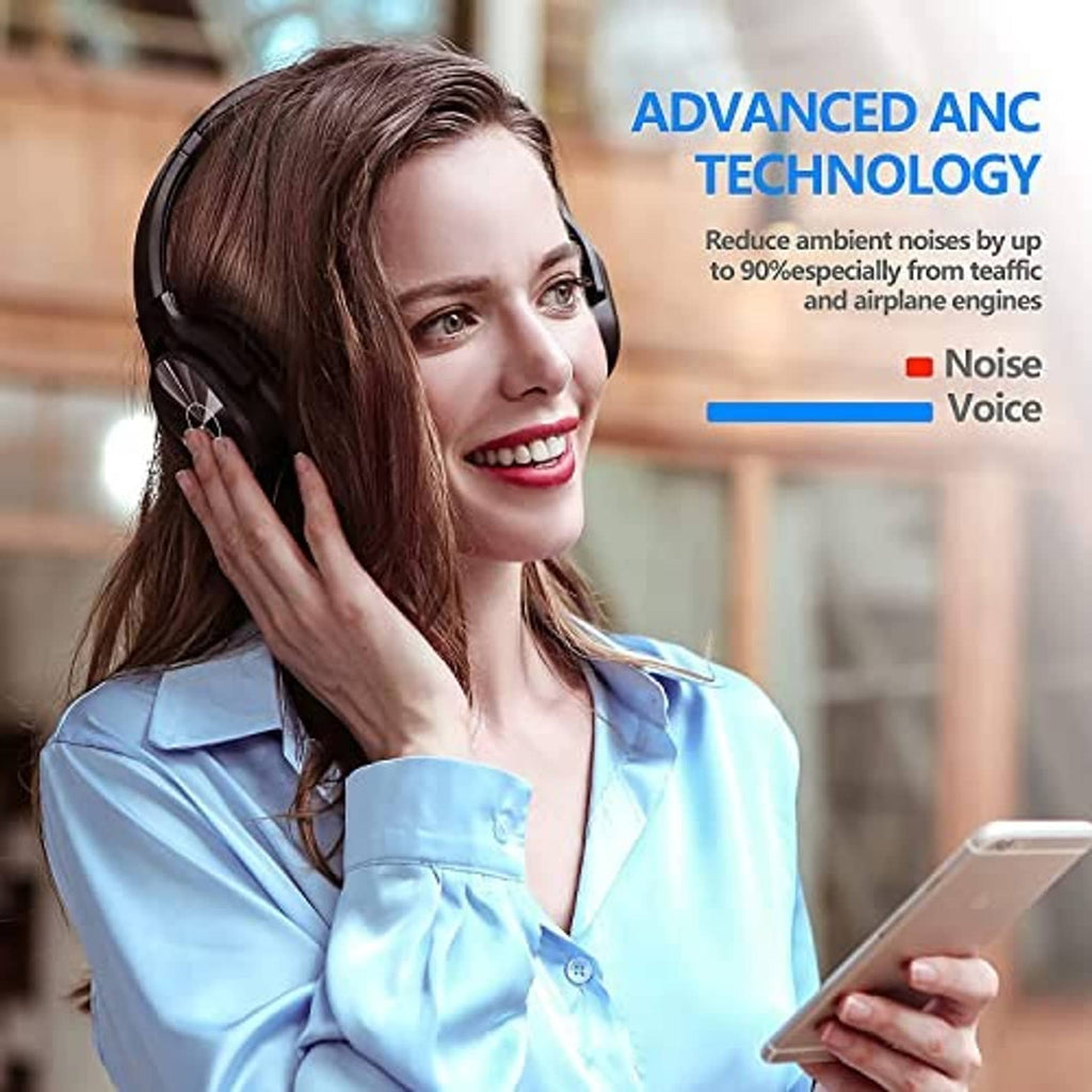 Black over-ear wireless headphones worn by a person with earcup controls