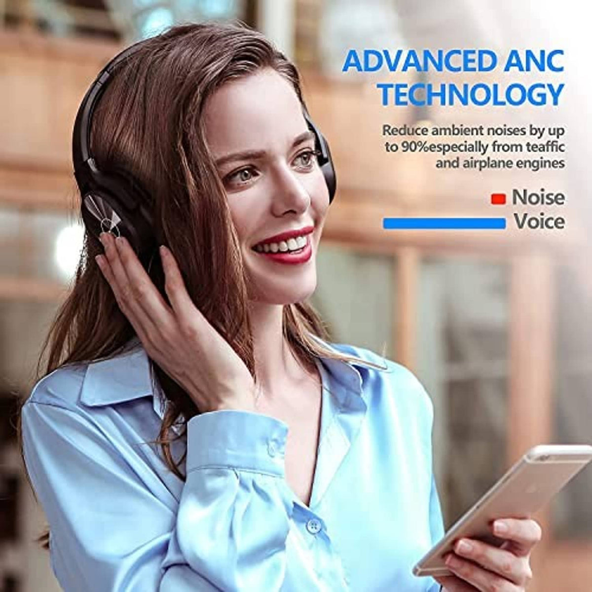 Black over-ear wireless headphones worn by a person with earcup controls