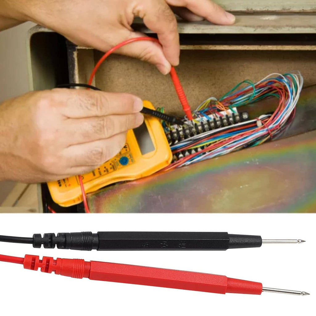 Hand using red and black multimeter leads on an electronics circuit board