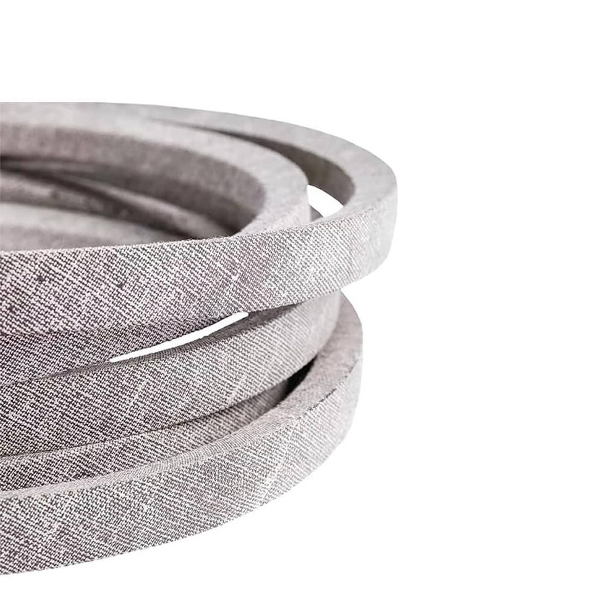 Close-up of gray deck belt loop edge on layered coils, fabric weave texture