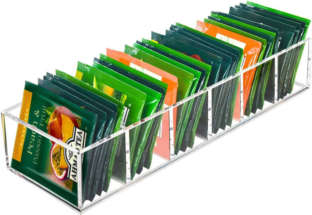 Clear acrylic tea bag organizer angled view with tea packets in multiple open compartments