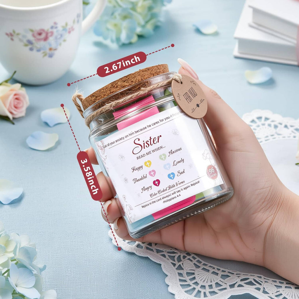 Sister verse jar held in hand, cork lid and rope, visible “Sister” text and pink strips