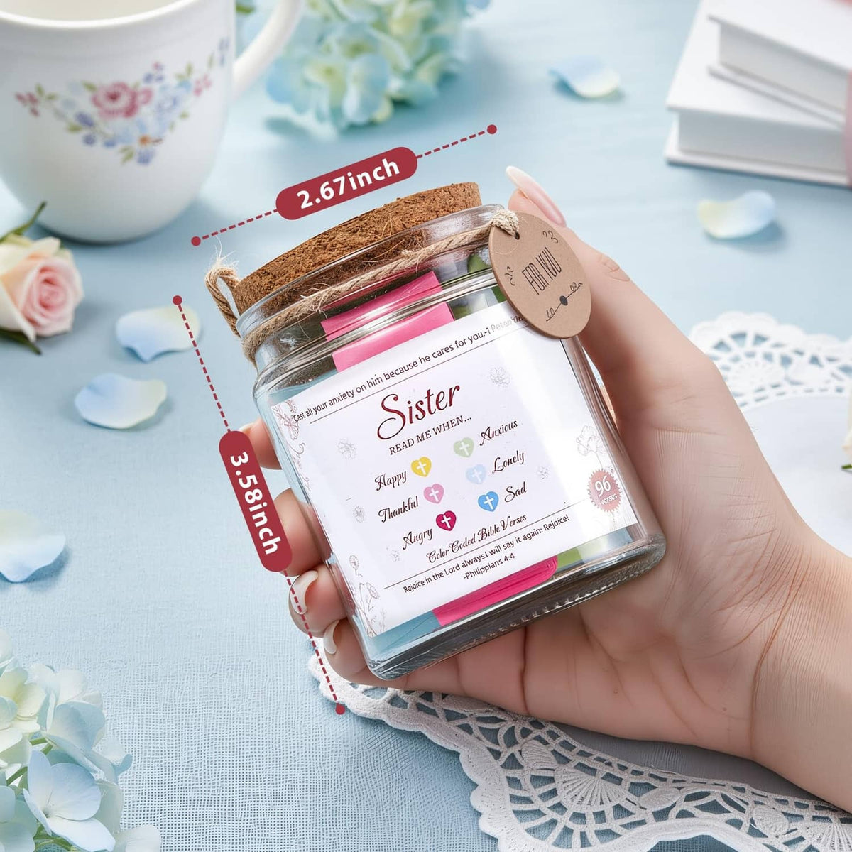 Sister verse jar held in hand, cork lid and rope, visible “Sister” text and pink strips