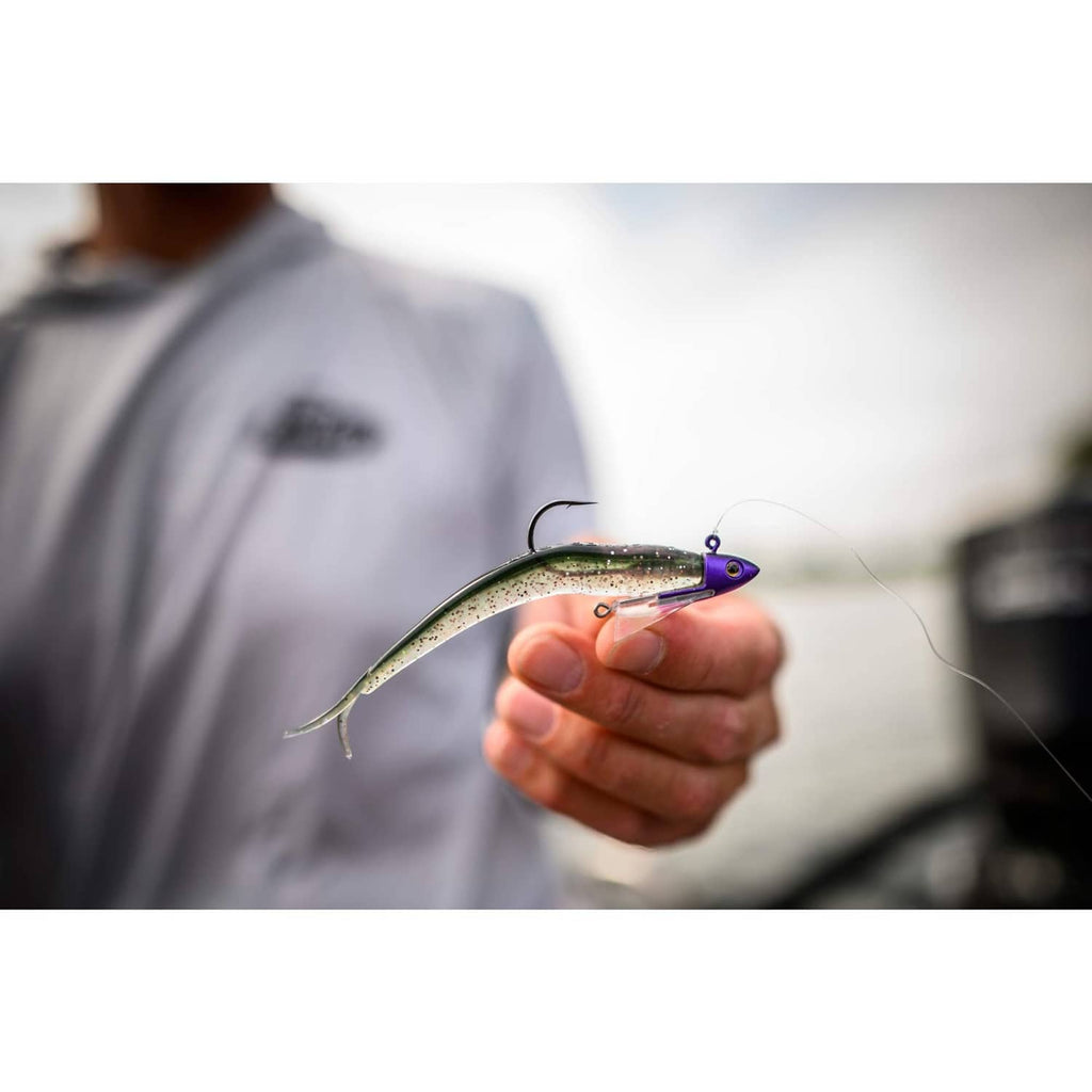 Green shiner-style swimbait with purple head and visible hook