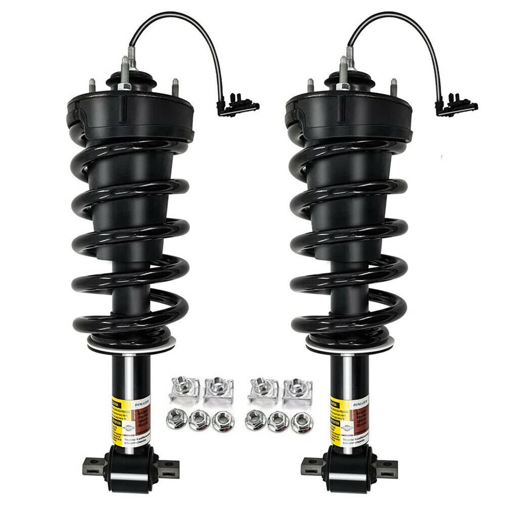 Two front shock struts with black coil springs and silver mounting bolts and brackets