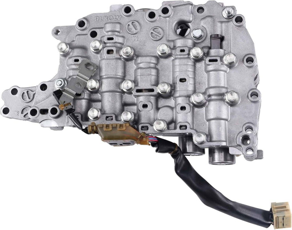 CVT transmission control valve body with solenoids, close side view with wiring plug