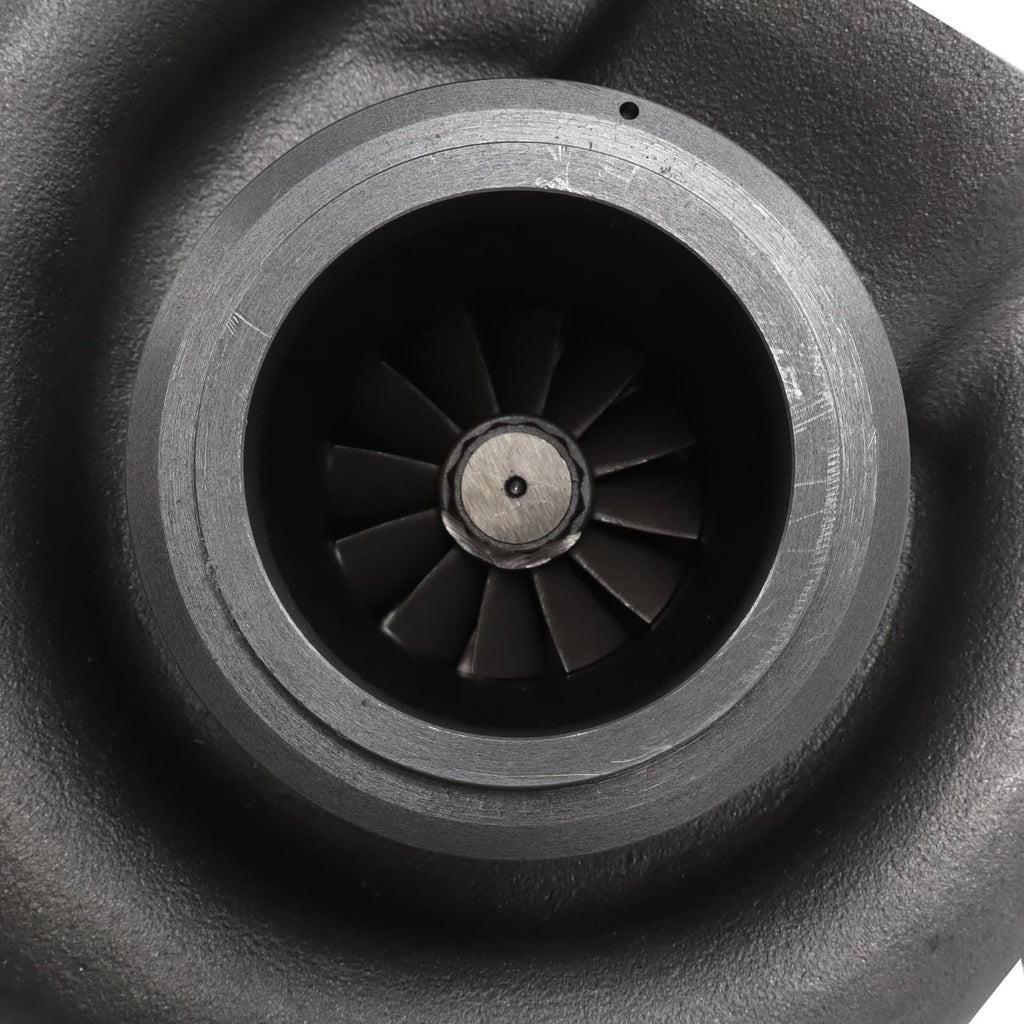 Turbocharger compressor wheel with dark blades and metal center hub